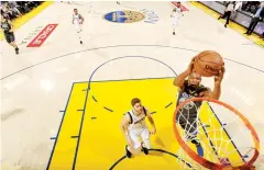  ?? AFP ?? The Warriors’ Kevin Durant dunks against the Mavericks.
