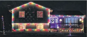  ??  ?? A beautifull­y decorated home on Lnu Avenue should put anyone in the holiday spirit