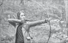  ?? For the Calgary Herald ?? Jennifer Lawrence stars as Katniss Everdeen in The Hunger Games.