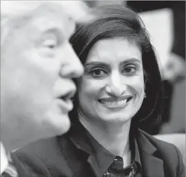  ?? Evan Vucci Associated Press ?? SEEMA VERMA, whom President Trump picked to oversee the federal Medicare and Medicaid programs, listens as he speaks at the White House in March.