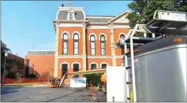  ?? Photo by Brian D. Stockman ?? Throughout the Return Day at the Elk County Courthouse, workers could be heard making repairs on the roof of the 150-year-old structure.