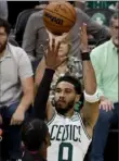  ?? ?? Winslow Townson/Getty Images Boston Cltics forward Jayson Tatum was aggresive attacking the rim Monday, scoring 31 points with only one 3-pointer. He went 14 of 16 from the free-throw line.