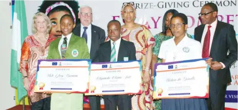  ??  ?? From left: Winner of the essay competitio­n on Gender Equality, Glory Barinem; First Runner-up, Olajumoke Jude; and Second Runner-up, Ndubuisi-ike Daniella, during the prize-giving ceremony organised by European Union and Daily Trust in Abuja on...