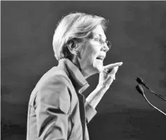  ?? — Reuters photo ?? Warren is seen addressing the audience at the morning plenary session at the Netroots Nation conference for policitcal progressiv­es in Atlanta, Georgia, US. US policy toward China has been misdirecte­d for decades and policymake­rs are now recalibrat­ing...