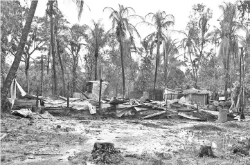  ?? — Reuters photo ?? File photo shows a burnt house in a village in Maungdaw in the north of Rakhine state in Myanmar.