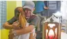  ?? AP ?? Father of Kian Loyd comforts his slain son’s girlfriend. —