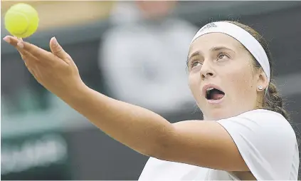  ?? Picture: AFP ?? POWER PLAY. Latvia’s Jelena Ostapenko serves against Slovakia’s Dominika Cibulkova during their Wimbledon quarterfin­al yesterday.