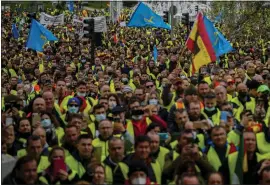  ?? MANU FERNANDEZ — THE ASSOCIATED PRESS ?? Truck drivers protest against the high price of fuel in Madrid in March. As food costs and fuel bills soar, inflation is sparking a wave of protests around the world.