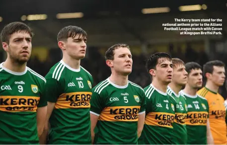  ??  ?? The Kerry team stand for the national anthem prior to the Allianz Football League match with Cavan at Kingspan Breffni Park.