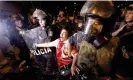  ?? ?? Police officers arrest a woman protesting against the government of Dina Boluarte in Lima, Peru. Photograph: Antonio Melgarejo/ EPA