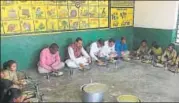  ?? HT PHOTO ?? BJP MLA Sanjay Gupta sharing mid day meal with students of a government school in Chail constituen­cy.