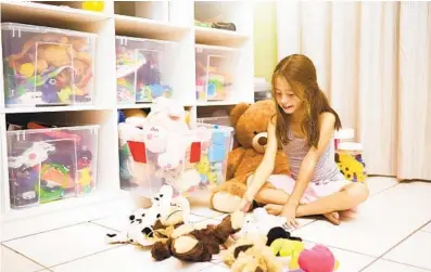  ?? GETTY IMAGES ?? Storing items in clear containers makes it easy to keep track of which toy goes where.