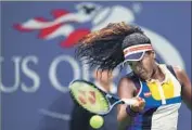  ?? Jewel Samad Agence France-Presse / Getty Images ?? UNSEEDED Naomi Osaka, born in Japan and raised in New York, stunned No. 6 Angelique Kerber 6-3, 6-1.