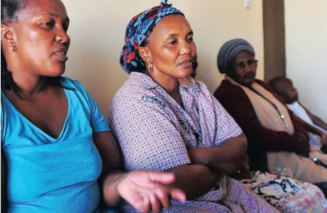  ?? Picture: PHANDO JIKELO ?? SEEKING ANSWERS: The family of Phumza Pita who was allegedly shot dead by police, says it wants justice to take its course. Pita’s aunt Nomalizo Nontshane, her mother Thobeka Pita and their neighbour Notest Kwankane at the New Crossroads home yesterday.