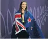  ?? PHOTO: GETTY IMAGES ?? Julia Ratcliffe, of New Zealand, poses with her hammer throw gold medal at New Zealand House on the Gold Coast yesterday.