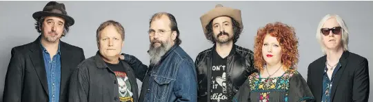  ??  ?? Steve Earle, third from left, lauds the Dukes — Brad Pemberton, left, Kelley Looney, Ricky Ray Jackson, Eleanor Whitmore and Chris Masterson — who can play music from any point in his career.