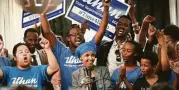  ?? Carlos Gonzalez / Star-Tribune via Associated Press ?? Somali activist Ilhan Omar, center, defeated 22-term state Rep. Phyllis Kahn in Tuesday’s nominating contest in the Minneapoli­s district.