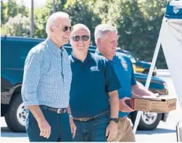  ?? MANUEL BALCE CENETA/AP ?? President Biden, left, greets labor union members of the Internatio­nal Brotherhoo­d of Electrical Workers Local 313 in New Castle, Del., commemorat­ing Labor Day.