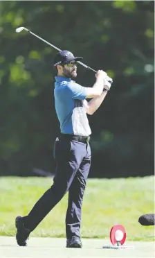  ?? LEON HALIP/GETTY IMAGES ?? Adam Hadwin of Abbotsford, B.C. was among a pack of players at 5-under 67 Thursday at the Rocket Mortgage Classic.