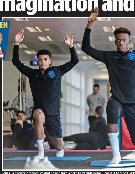  ??  ?? Hands up if you’re a fearless young England star: Sancho (left) and Hudson-Odoi in St George’s Park gym yesterday