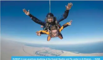  ??  ?? KUWAIT: A man practices skydiving at the Kuwait Skydive and Fly center in Al-Khairan.