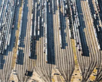  ?? JAMES MACDONALD / BLOOMBERG FILES ?? Freight trains and oil tankers sit in a railyard in Toronto. Freight-train congestion isn’t unique to Canada but it’s particular­ly acute here. The struggle to get products to market is hurting business and has turned off investors.