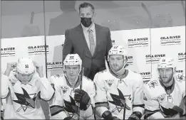  ?? CHRISTIAN PETERSEN — GETTY IMAGES, FILE ?? Sharks coach Bob Boughner watches from the bench during the first period against the Coyotes at Gila River Arena on Jan. 16 in Glendale, Arizona.