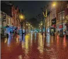  ?? ?? January is an image of Broad Street after a rainy evening, walking home from the Biscuit Factory,