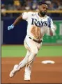  ?? Mike Ehrmann / Getty Images ?? The Rays’ Randy Arozarena runs to third on a double by Wander Franco during Thursday’s ALDS Game 1 against the Red Sox.