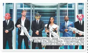  ??  ?? Chris Hemsworth, Tessa Thompson and F Gary Gray at the ‘Men in Black: Internatio­nal’ film photocall, in Beijing, China, on June 9.