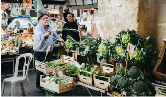  ?? ?? The best food in the world? A market selling fresh produce in Sicily