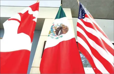  ?? AFP ?? US, Mexico and Canada have agreed to free trade deal to replace the 25-year-old North American Free Trade Agreement.