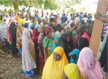  ??  ?? Voters on queue at Atebheda Primary School, Agbede, Etsako West LGA. By Idris N Momoh