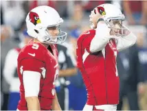  ?? Picture / AP ?? Chandler Catanzaro ( right) missed a match- winning kick for Arizona, which drew a sharp response from his coach.