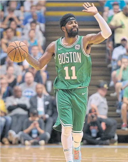 ??  ?? The Celtics’ Kyrie Irving in action during a pre-season game.