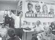  ?? John Davenport / San Antonio Express-News ?? Bexar County Democratic Party Chairman Manuel Medina instructs volunteers in a recent phone bank effort to reach potential voters.