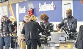  ??  ?? Service-wise, Southwest maintains a free checked baggage policy that cuts costs for some travelers.