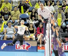  ?? —AUGUST DELA CRUZ ?? Angeline Poyos (No. 17) soared offensivel­y for the Tigresses, but the Lady Bulldogs still got the win.