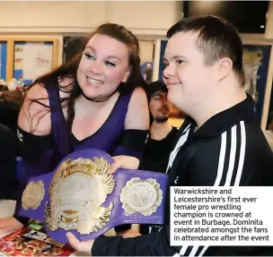  ?? ?? Warwickshi­re and Leicesters­hire’s first ever female pro wrestling champion is crowned at event in Burbage. Dominita celebrated amongst the fans in attendance after the event