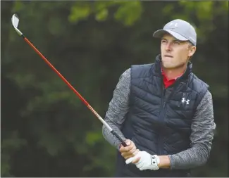  ?? The Associated Press ?? Jordan Spieth of the United States plays off the fifth tee during the first round of the British Open at Royal Birkdale in Southport, England, on Thursday. Spieth was in a three-way tie for the lead at 5 under.