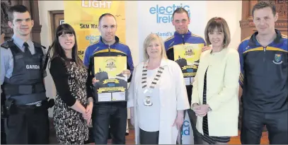  ??  ?? Adam Nolan, Nicola O'Leary, Electric Ireland, County Player Patrick McWalter, Cllr Tracy O'Brien, Cathaoirle­ach Bray Town Council, county player Damian Power, Joan Freeman, CEO Pieta House, county player Paul Earls.