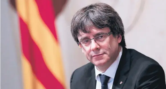  ?? FOTO: AGENCIA AFP ?? El presidente catalán Carles Puigdemont afirmó que estaba dispuesto a convocar elecciones si se daba garantía de que la celebració­n se daría con normalidad.