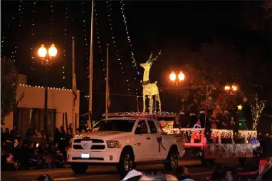  ?? RECORDER PHOTO BY JUAN AVILA ?? One of the many festive parade entries that dazzled thousands of spectators Monday, December 3 at the annual Children’s Christmas Parade in downtown Portervill­e. This year’s parade theme was ‘A Starlight Christmas’