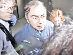  ??  ?? Ghosn leaves his lawyer’s office in Tokyo in this file photo. — Reuters photo