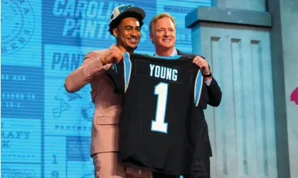  ?? Photograph: Kirby Lee/USA Today Sports ?? Alabama quarterbac­k Bryce Young stands with NFL commission­er Roger Goodell after he was drafted first overall by the Carolina Panthers on Thursday night.