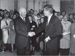  ?? AP PHOTO, FILE ?? President Eisenhower greeting President-elect John F. Kennedy as he arrives at the White House on Dec. 6, 1960.