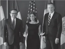  ?? SEAN KILPATRICK, THE CANADIAN PRESS ?? Minister of Foreign Affairs Chrystia Freeland between Ildefonso Guajardo Villarreal, left, and Ambassador Robert E. Lighthizer, of the United States .