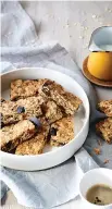  ?? PHOTOS: MANJA WACHSMUTH ?? Top left: Banana, blueberry &amp; oat smoothie; fruit &amp; nut oat slice , left; and savoury wholegrain porridge.