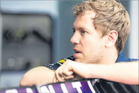  ?? Picture: Getty Images. ?? Sebastian Vettel waiting to drive during practice day at the Sepang Circuit.