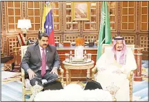  ??  ?? A handout picture released by the Venezuelan Presidency shows Venezuelan President Nicolas Maduro (left), meeting with the King of Saudi Arabia Salman bin Abdulaziz during his visit to the Saudi Royal Palace in Riyadh on Oct 23. Maduro of OPEC member...